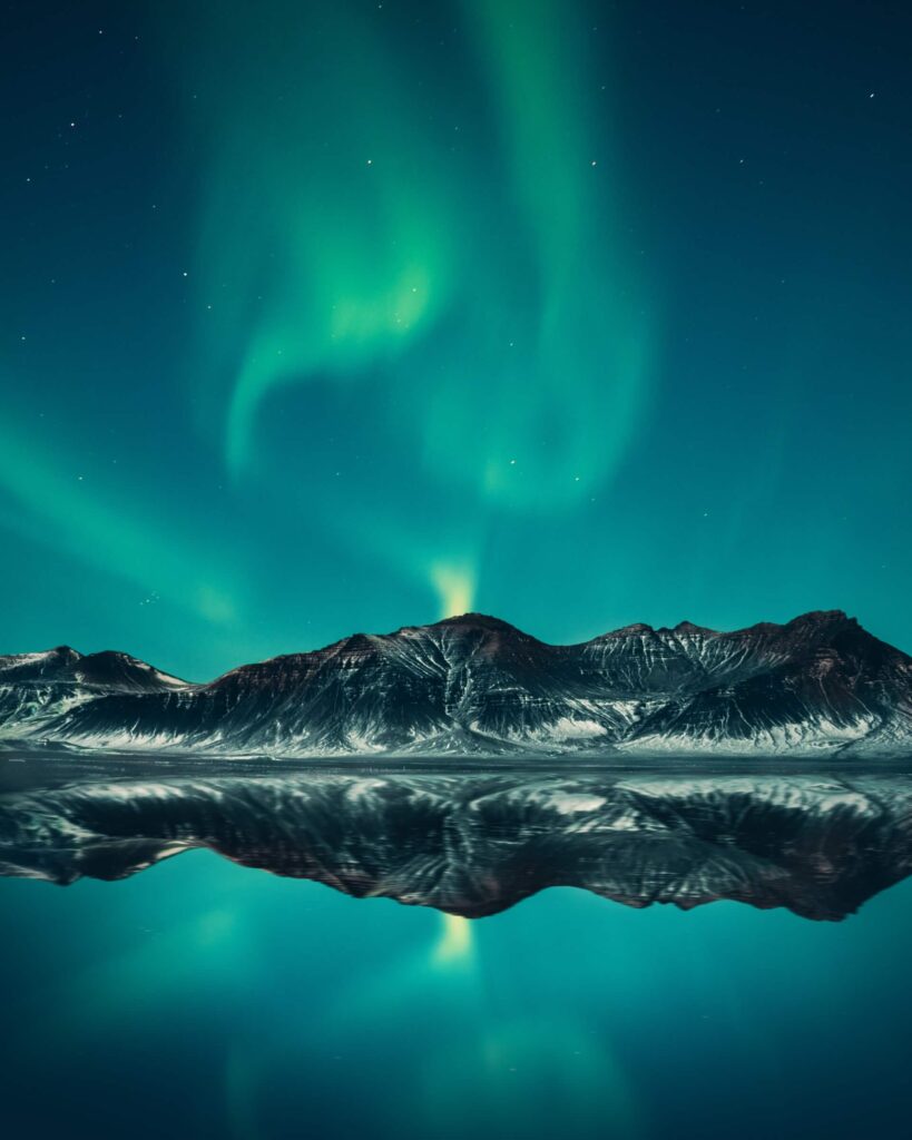 northen lights at night over a lake